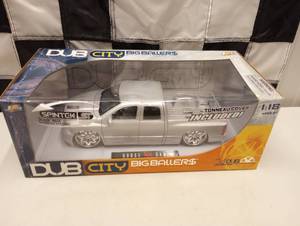 lot 270 image: Dub City Big Ballers Dodge Ram 118th Scale Die Cast Truck