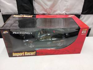 lot 274 image: Jada Toys Import Racer Toyota Celica  118th Scale Die Cast Car