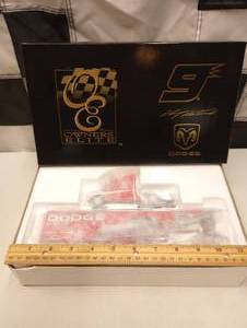 lot 292 image: Owners Elite Kasey Kahne #9 Dodge Dealers 164th Scale Die Cast Coin Bank Hauler