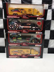 lot 310 image: Racing Champions Racing Team Transporters 164th Scale Die Cast