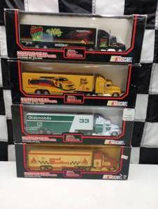 lot 311 image: Racing Champions Racing Team Transporters 164th Scale Die Cast
