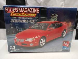 lot 314 image: Ertl AMT Rides Magazine 2004 Pontiac GTO 125th Scale Model Kit