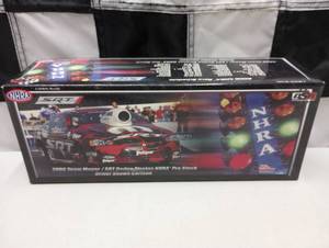 lot 392 image: NHRA  Racing Champion Shawn Carlson  124th Scale Die Cast Pro Stock Funny Car