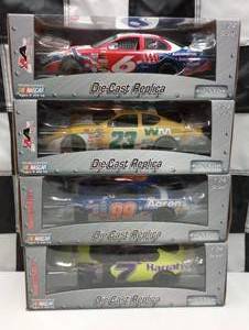 lot 472 image: Team Caliber Pit Stop 124th Scale Die Cast Cars