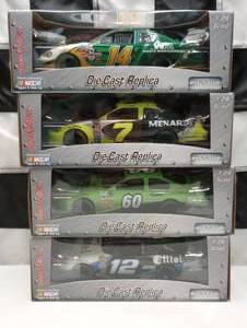 lot 473 image: Team Caliber Pit Stop 124th Scale Die Cast Cars