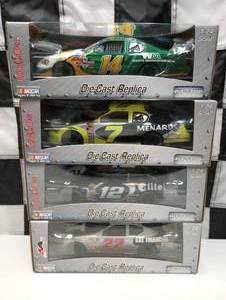 lot 477 image: Team Caliber Pit Stop 124th Scale Die Cast Cars