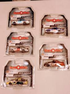 lot 448 image: Team Caliber Pit Stop 164th Scale Die Cast Cars