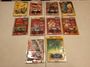 lot 554 image: Assorted Action 164th Scale Die Cast Cars