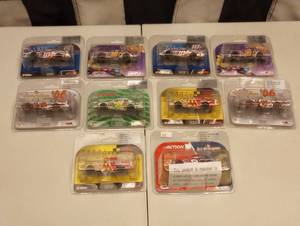 lot 561 image: Assorted Action 164th Scale Die Cast Cars