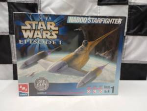 lot 656 image: Ertl Amt Star Wars Episode 1 Naboo Starfighter 148th Scale Die Cast Model