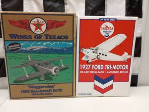 lot 669 image: (2) Ertl Die Cast Planes Coin Banks