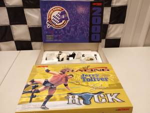 lot 692 image: Action Jerry Toliver WWF  The Rock 124th Scale Die Cast Funny Car