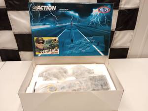 lot 693 image: Action NHRA Tony Pedregon Quaker State 124th Scale Die Cast Funny Car