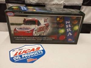 lot 700 image: Racing Champion NHRA Tony Bartone Lucas Oil Products 124th Scale Die Cast Funny Car