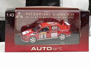 lot 730 image: Autoart Mitsubishi Lancer Evo VII WRC 143rd Scale Die Cast Car