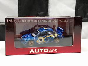 lot 732 image: Autoart Subaru Impreza WRC 143rd Scale Die Cast Car