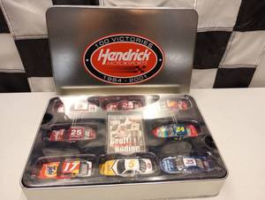 lot 859 image: Hendricks Motor Sports Celebrates The 100th Win Tin Gift Set