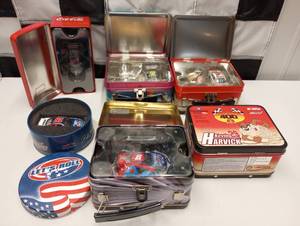 lot 860 image: Assorted Tins With 164th Scale Die Cast Cars