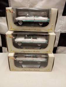 lot 865 image: Signature Models 1955 Packard Caribbean Die Cast
