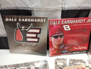 lot 896 image: Assorted Nascar DVDs Air Fresheners & Cameras.