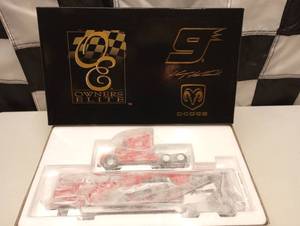 lot 932 image: Owners Elite Kasey Kahne #9 Dodge Dealers Transporter 164th Scale Die Cast Coin Bank