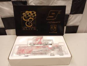 lot 933 image: Owners Elite Kasey Kahne #9 Dodge Dealers Transporter 164th Scale Die Cast Coin Bank