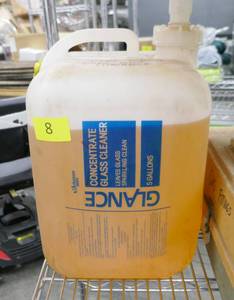 lot 8 image: About 4 gallons of Tiki Torch fluid with Citronella