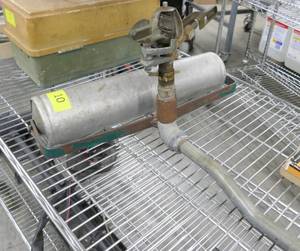 lot 10 image: Vintage roller water sprinkler