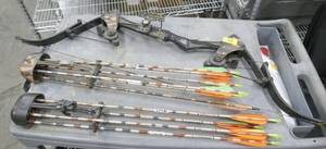 lot 18 image: Compound bow 49 inches long with 2 quivers 10 arrows