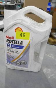 lot 48 image: New unopened gallon of 15W-40 oil