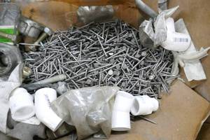 lot 54 image: Box full of misc screws, nails, pvc, etc, etc