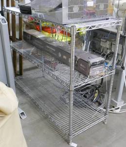 lot 87 image: Wire shelving unit 48x18 with 3 shelves plus an extra shelf