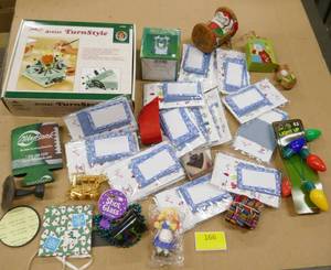 lot 166 image: Misc lot - gift tags, shot glass, christmas light necklace, craft holder for painting and gluing