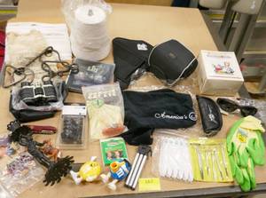 lot 167 image: Misc lot - big spool of thread, velcro, binoculars, dcor, camera tripod, 100 garden stakes