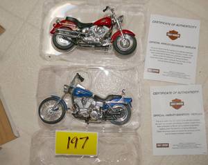 lot 197 image: TWO new with box Harley Davidson toy replica motorcycles