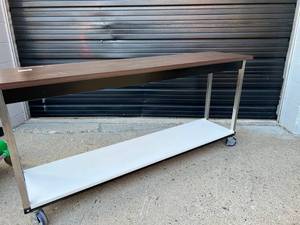 lot 47 image: MSRP $2000 High Quality HON Utility Training Table With Shelf On Casters Mobile Cart With Wood Laminate Top &amp Lower Storage Shelf - Great Condition&nbsp A couple Light Surface Scratches - Moves Good