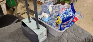 lot 717 image: Bathroom caddy of cleaning supplies