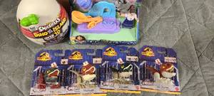 lot 723 image: Bag of Dinosaur and Enchanto Toys