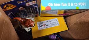 lot 730 image: Bag of assorted toys and pop-it toys