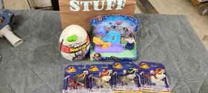 lot 726 image: Bag of Dinosaur and Enchanto Toys