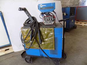 lot 75 image: Miller CP-300