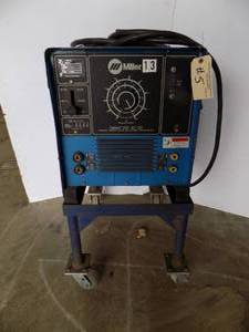 lot 5 image: Miller Dialarc 250 ACDC Arc Welding Power Source on Steel Stand