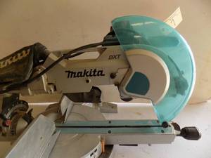 lot 7 image: 12 Makita DXT Miter Saw
