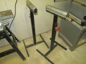 lot 52 image: Pair of adjustable roller stands.
