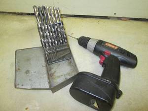 lot 64 image: Coleman cordless drill with battery