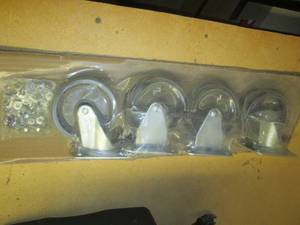 lot 102 image: New set of casters 2-swivel, 2-stationary