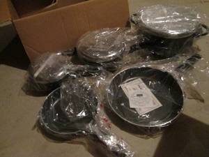 lot 142 image: 8 piece signature metal cookware set