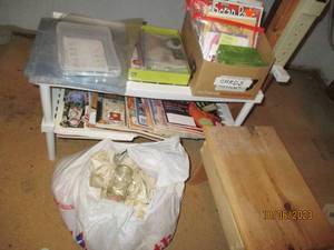 lot 281 image: Plastic shelf loaded with craft books and  more