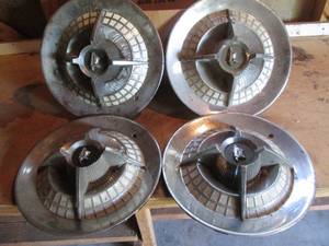 lot 205 image: Chevy Knights Hubcaps