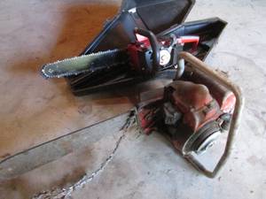 lot 214 image: Pair of Vintage chainsaws